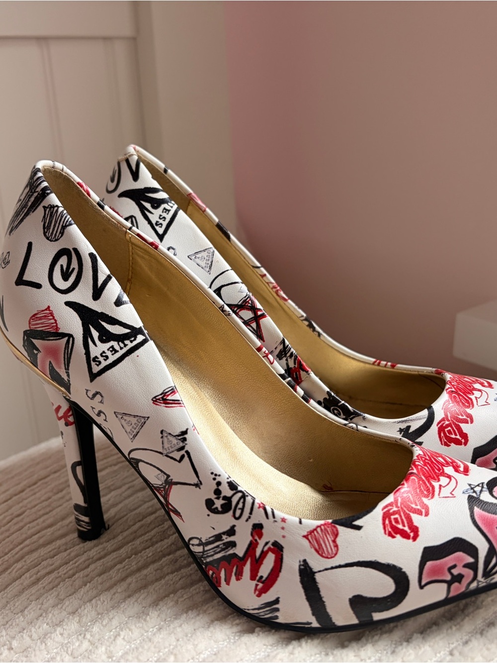 Guess White Graffiti-Print Stilettos with Black and Red Accents